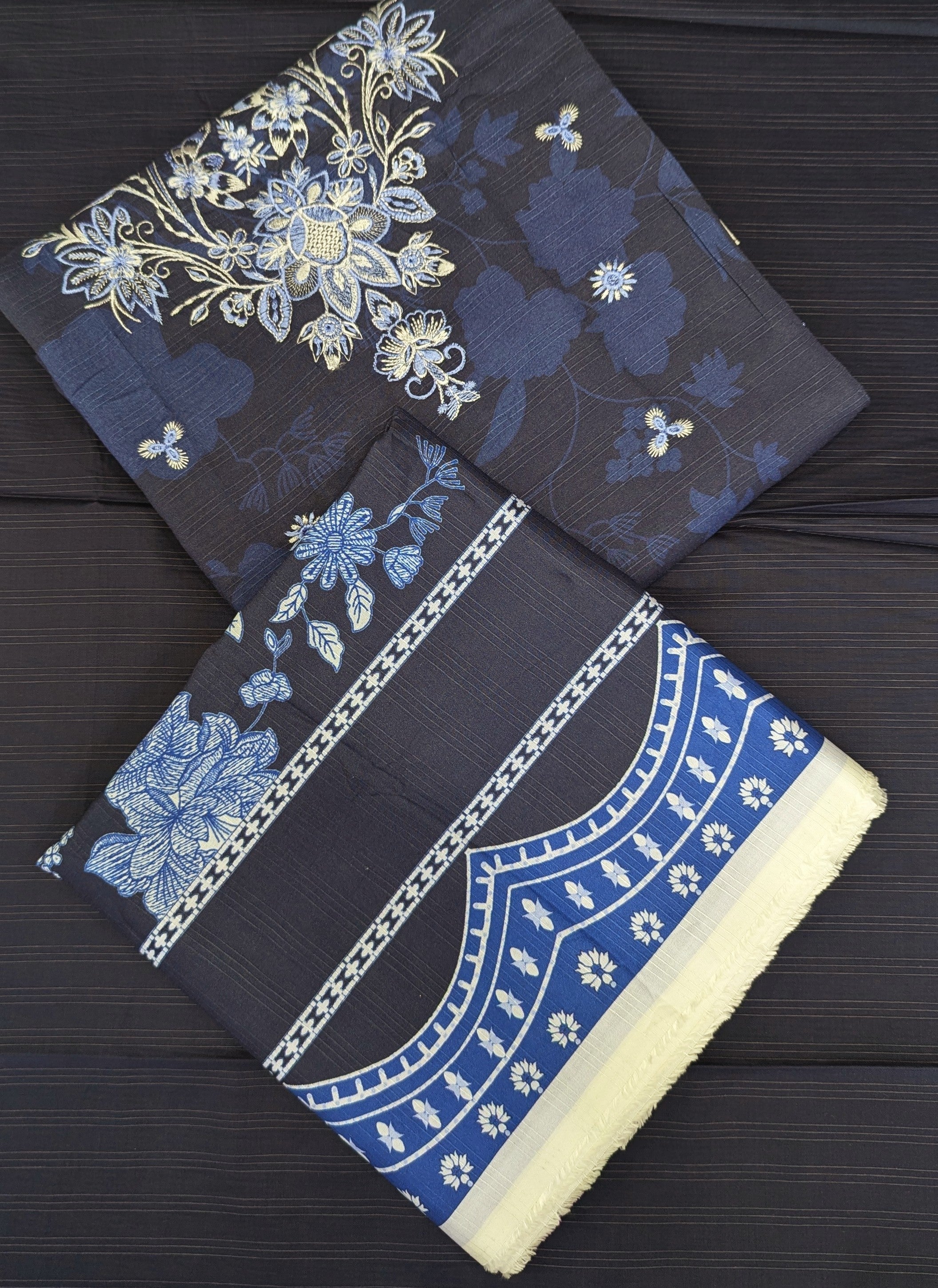 Embroidered linen with printed shawl