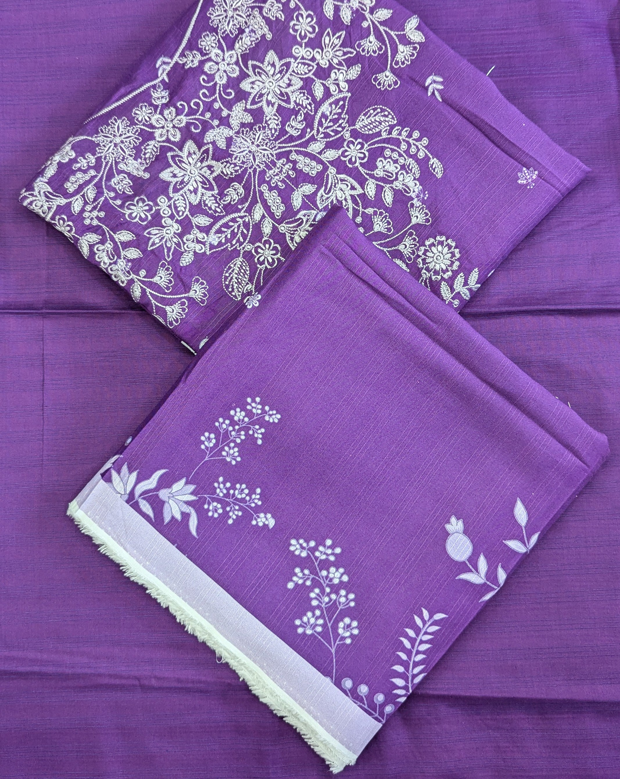 Embroidered linen with printed shawl