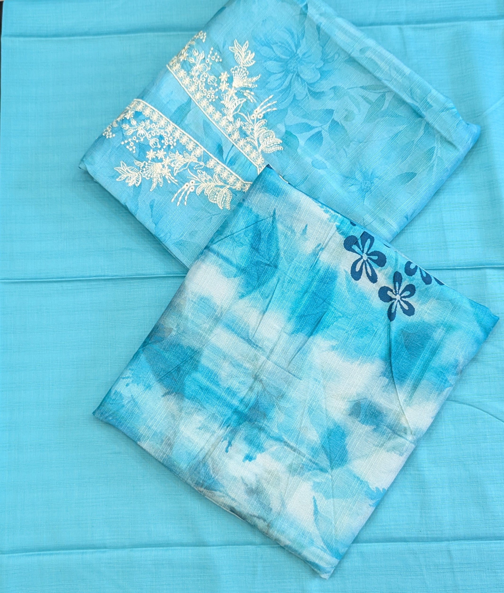 Embroidered linen with printed shawl