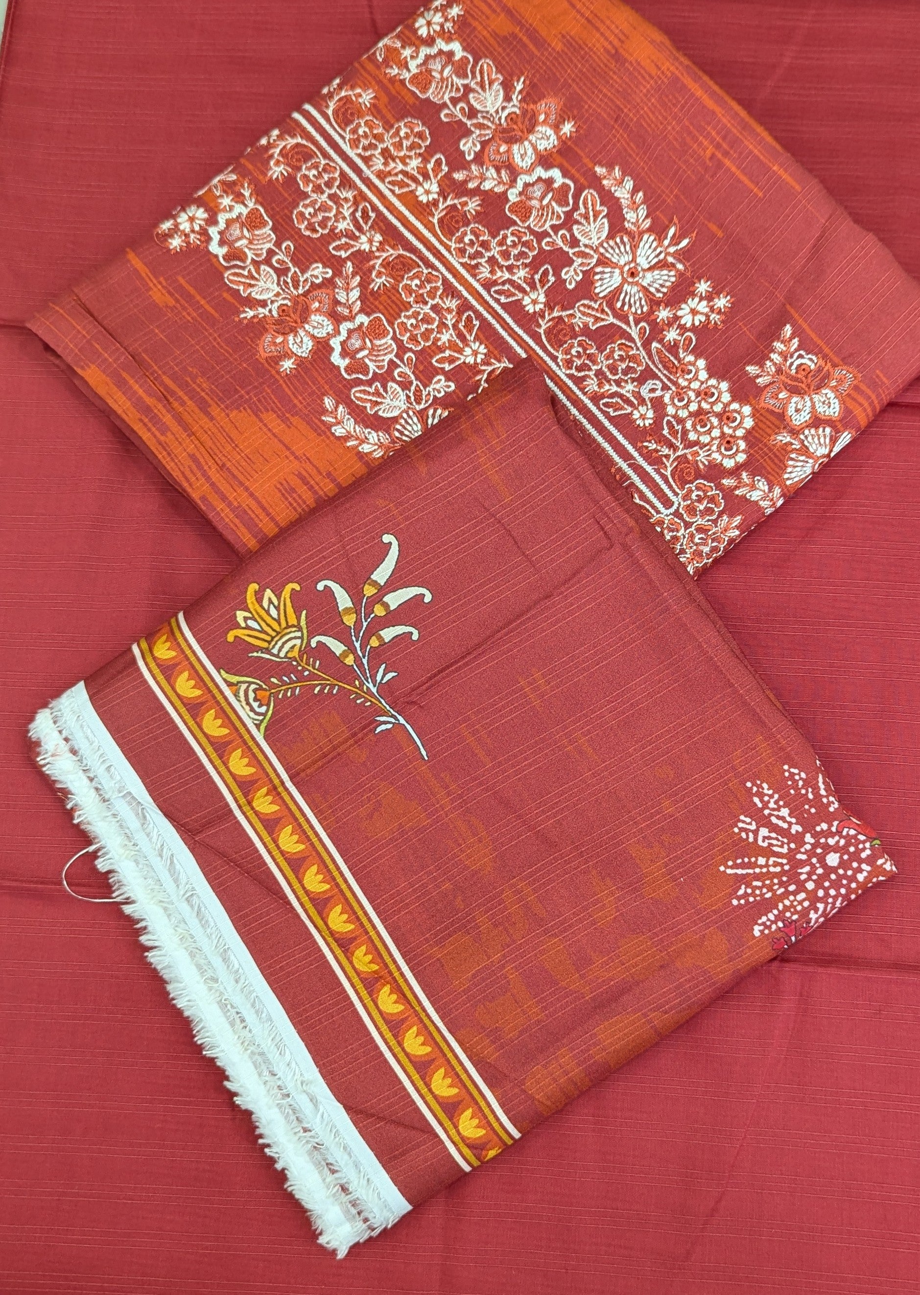 Embroidered linen with printed shawl